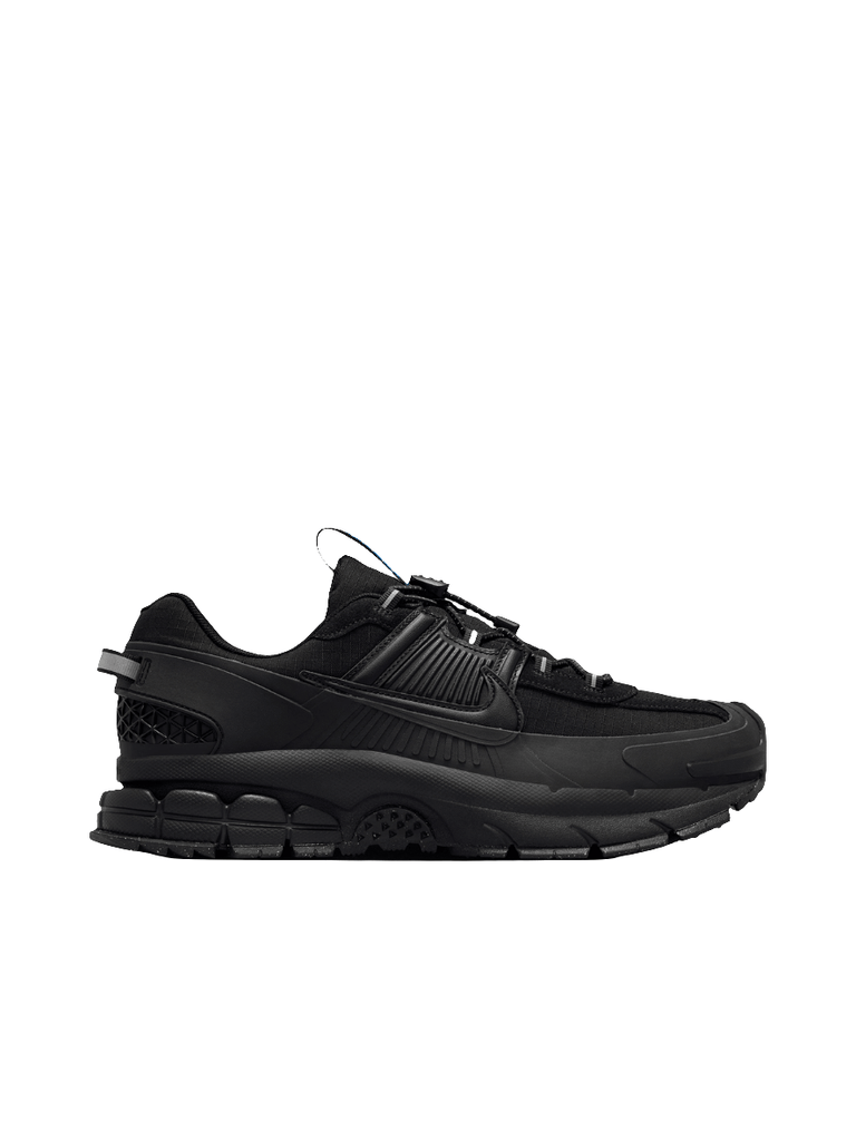 Nike Zoom Vomero Roam Black SneakerDesigned for city conditions, this winterized version of the Vomero is made for wet weather. Durable materials and a rubber mudguard work together to help safeguard your shoes from dirt and puddles. Plus, a chunky midsol